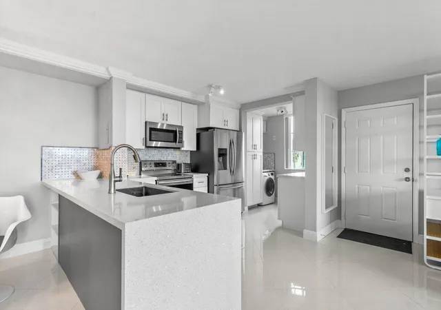 Photo 3 of Condo for sale at 180 Yacht Clb Way #102, Hypoluxo, FL 33462 | MLS# B26077201 | Listing updated on 2026-10-10