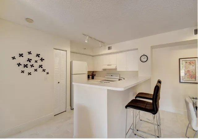 Photo 2 of Condo for sale at 135 Yacht Clb Way #207, Hypoluxo, FL 33462 | MLS# B26075998 | Listing updated on 2026-09-23