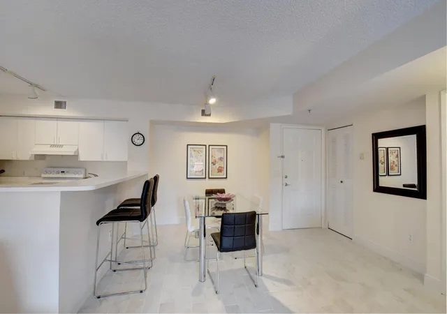 Photo 3 of Condo for sale at 135 Yacht Clb Way #207, Hypoluxo, FL 33462 | MLS# B26075998 | Listing updated on 2026-09-23