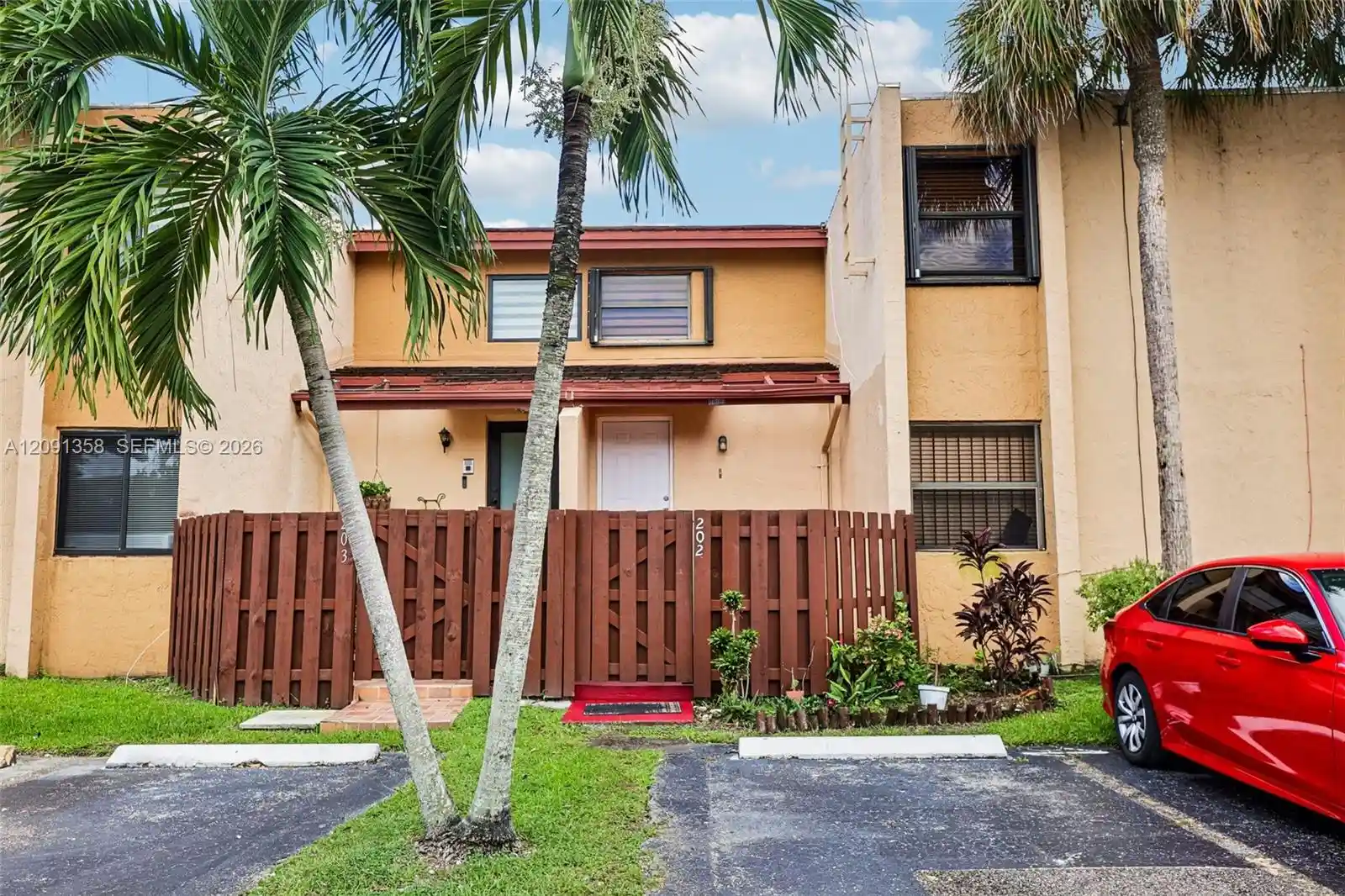 Listing Photo 1 - Condo for sale at Indian Lake Village, Unit 5-202 241 W Park Dr, Indian Lake Village, Miami, FL 33172 | Built Year: undefined - undefined