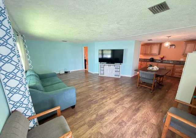 Photo 3 of Manufactured home for sale at 7337 Se Swan Ave, Hobe Sound, FL 33455 | MLS# B26078489 | Listing updated on 2026-10-10
