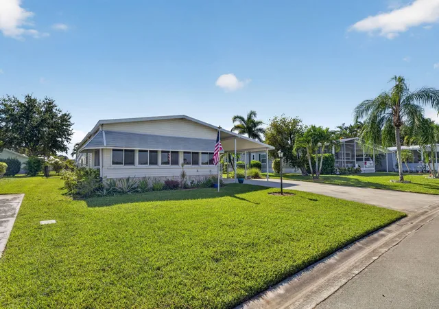 Photo 2 of Manufactured home for sale at 9065 Sw Chevy Cir, Stuart, FL 34997 | MLS# B26078674 | Listing updated on 2026-10-10