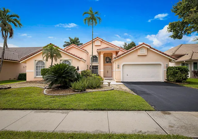 Photo 3 of Single family home for sale at 4900 Nw 100th Terrace, Coral Springs, FL 33076 | MLS# B26078716 | Listing updated on 2026-10-10