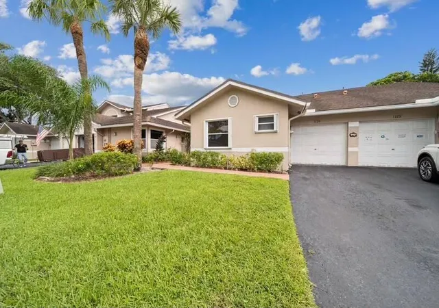 Photo 1 of Single family home for sale at 1129 W Lakes Dr, Deerfield Beach, FL 33442 | MLS# B26079125 | Listing updated on 2026-10-01