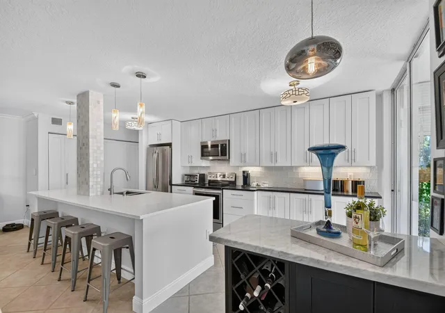 Photo 4 of Condo for sale at 103 Half Moon Cir #C1, Hypoluxo, FL 33462 | MLS# B26080056 | Listing updated on 2026-09-24