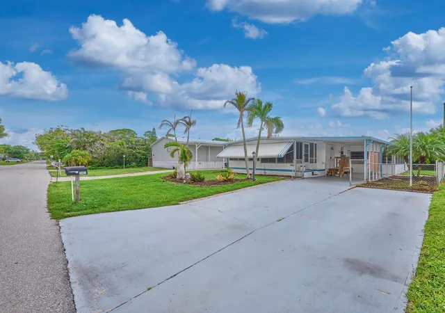 Manufactured home for sale at 7965 SE Wren Ave, Hobe Sound, FL 33455 | MLS# B26080269