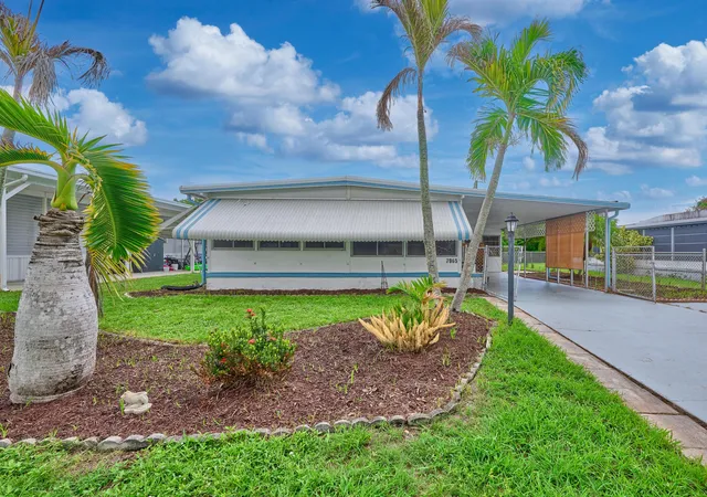 Photo 2 of Manufactured home for sale at 7965 Se Wren Ave, Hobe Sound, FL 33455 | MLS# B26080269 | Listing updated on 2026-09-25