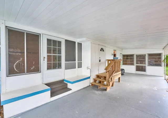 Photo 3 of Manufactured home for sale at 7965 Se Wren Ave, Hobe Sound, FL 33455 | MLS# B26080269 | Listing updated on 2026-09-25