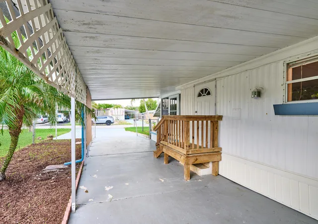 Photo 3 of Manufactured home for sale at 7965 SE Wren Ave, Hobe Sound, FL 33455 | MLS# B26080269 | Listing updated on 2026-09-25