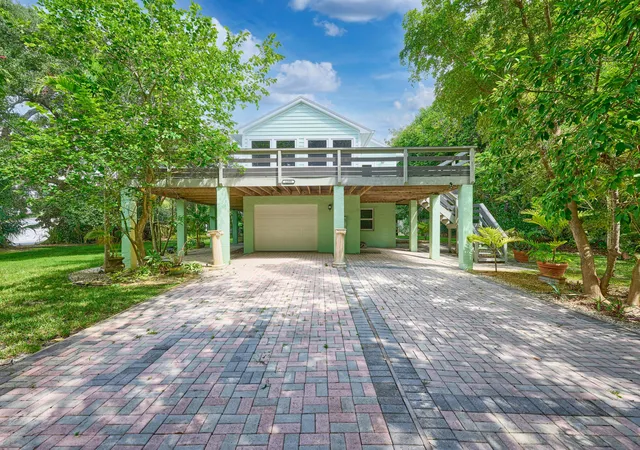 Photo 2 of Single family home for sale at 1398 Sw Palm City Rd, Stuart, FL 34994 | MLS# B26080543 | Listing updated on 2026-09-27
