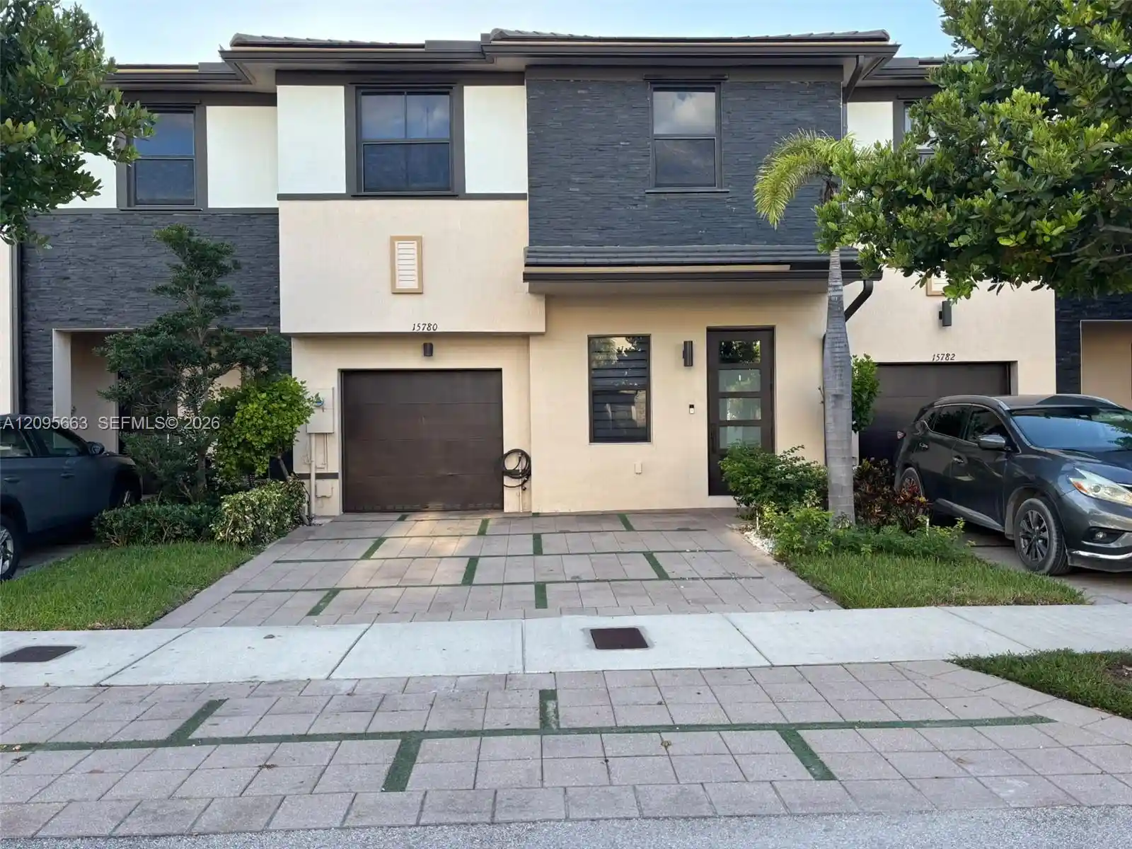 Listing Photo 1 - Condo for sale in 15780 Nw 91St Ct located at 15780 Nw 91St Ct, Miami Lakes, FL 33018 - Unit 15780 NW 91st Court