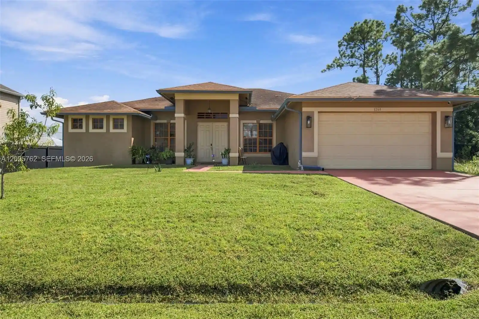 Photo 1 of Single family home for sale at 1268 Sw Patricia Ave, Port Saint Lucie, FL 34953 | MLS# A12095762 | Listing updated on 2026-10-13
