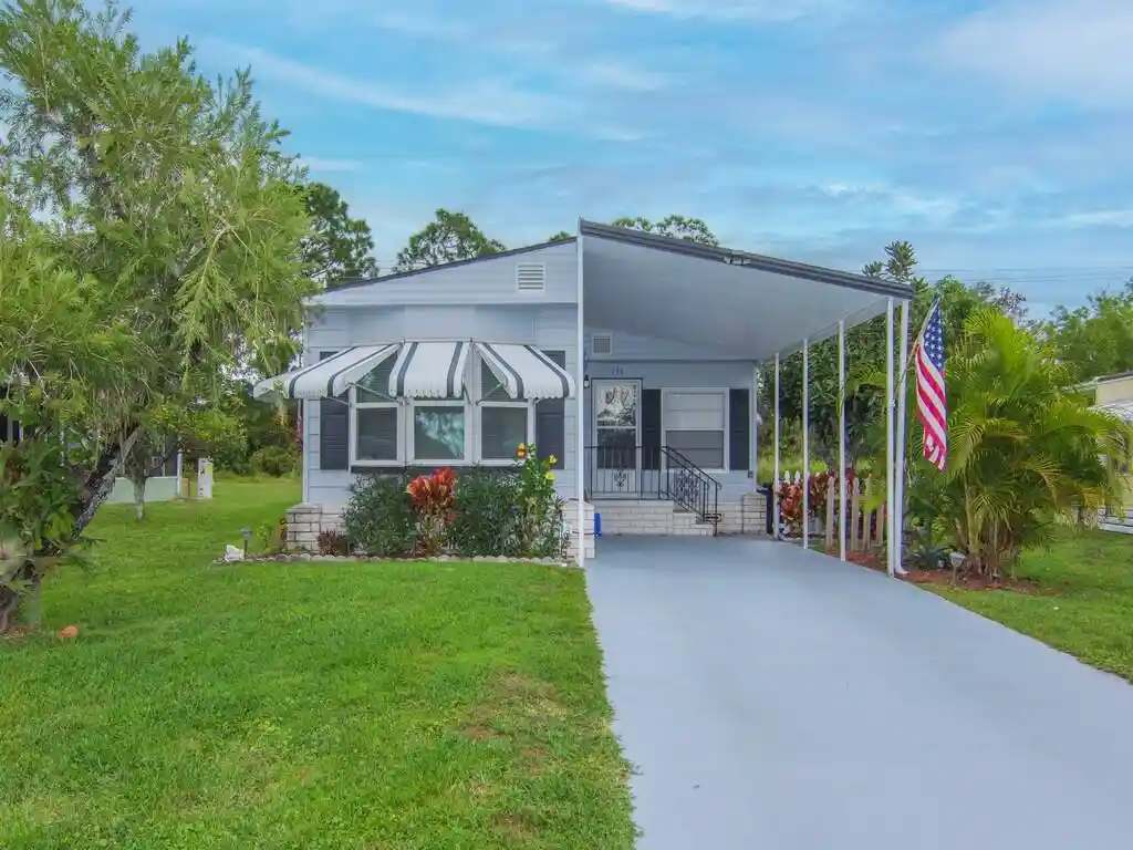 Photo 1 of Manufactured home for sale at 61 E Caribbean, Port Saint Lucie, FL 34952 | MLS# B26080985 | Listing updated on 2026-09-27