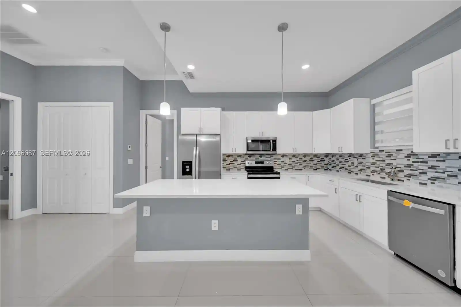 Photo 1 of Single family home for sale at 105 E 15th Street, Lehigh Acres, FL 33972 | MLS# A12096687 | Listing updated on 2026-10-27