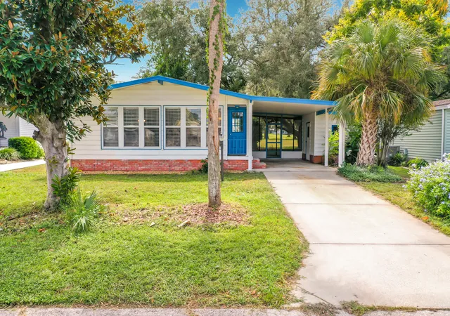 Photo 1 of Manufactured home for sale at 910 Orchid St, Lady Lake, FL 32159 | MLS# B26081994 | Listing updated on 2026-10-01