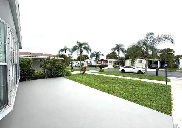 Photo 2 of Manufactured home for sale at 3319 Nw 64th Court, Coconut Creek, FL 33073 | MLS# B26081814 | Listing updated on 2026-09-30