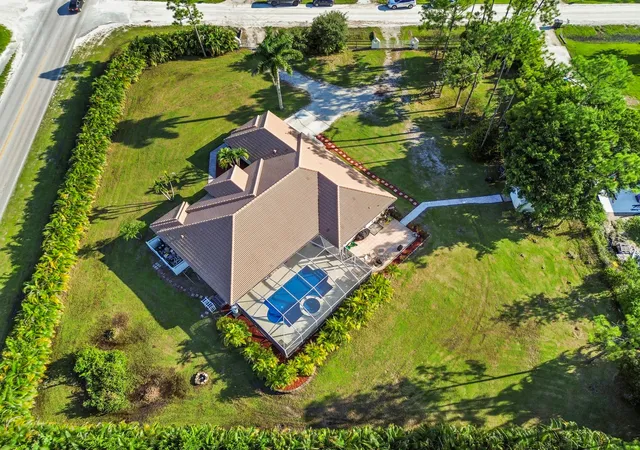 Photo 2 of Single family home for sale at 12521 83rd Lane N, West Palm Beach, FL 33412 | MLS# B26082181 | Listing updated on 2026-10-10