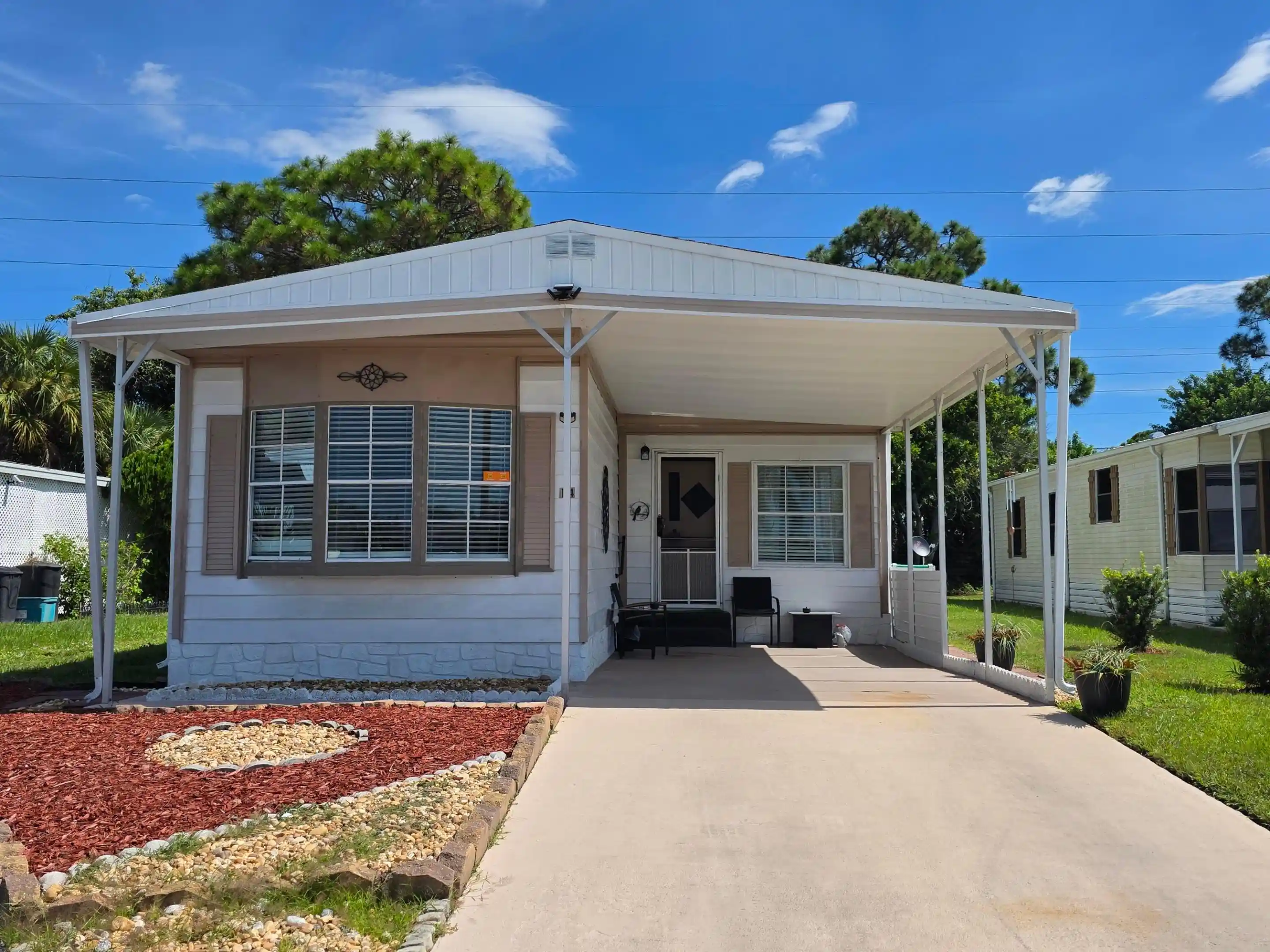 Photo 1 of Manufactured home for sale at 14 Arboles Ln, Port Saint Lucie, FL 34952 | MLS# B26082205 | Listing updated on 2026-10-29