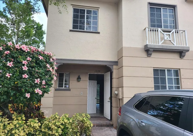 Photo 1 of Townhouse for sale at 1228 Lucaya Dr, Riviera Beach, FL 33404 | MLS# B26082289 | Listing updated on 2026-10-10