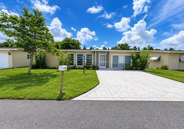 Single family home for sale at 1410 NW 48th Place, Deerfield Beach, FL 33064 | MLS# B26082305