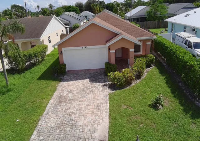 Photo 2 of Single family home for sale at 5795 Se Mitzi Ln, Stuart, FL 34997 | MLS# B26082493 | Listing updated on 2026-10-10