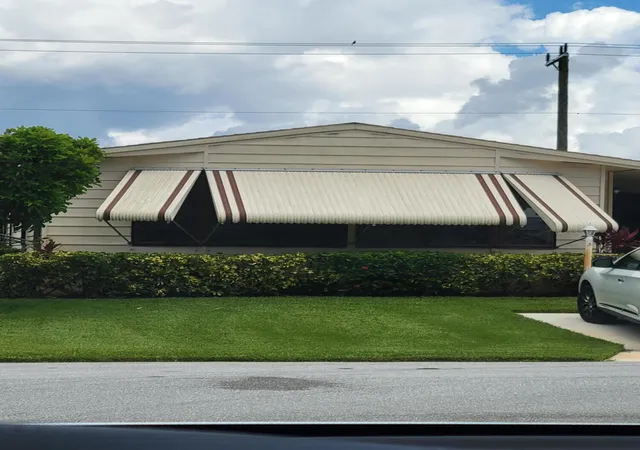 Photo 1 of Manufactured home for sale at 7435 Se Independence Ave, Hobe Sound, FL 33455 | MLS# B26082676 | Listing updated on 2026-10-09