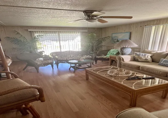 Photo 3 of Manufactured home for sale at 97 N Warner Dr, Jensen Beach, FL 34957 | MLS# B26082796 | Listing updated on 2026-10-08