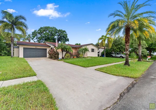 Photo 2 of Single family home for sale at 821 Nw 42nd Avenue, Coconut Creek, FL 33066 | MLS# B26082803 | Listing updated on 2026-10-10
