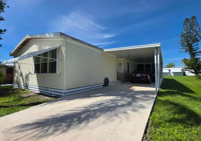 Photo 2 of Manufactured home for sale at 77 Mediterranean Blvd E, Port Saint Lucie, FL 34952 | MLS# B26083192 | Listing updated on 2026-10-02