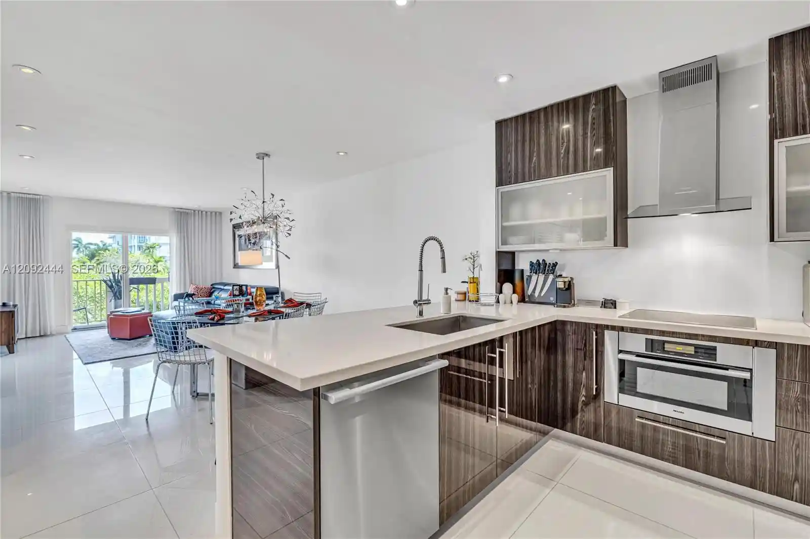Photo 1 of Condo for sale at 1120 99th Street #302, Bay Harbor Islands, FL 33154 | MLS# A12092444 | Listing updated on 2026-10-21