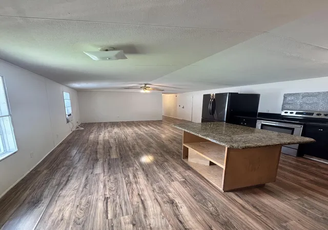 Photo 3 of Manufactured home for sale at 1027 Marco Ct, Greenacres, FL 33463 | MLS# B26083487 | Listing updated on 2026-10-08