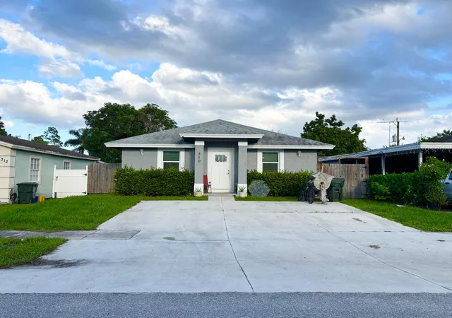 Photo 1 of Single family home for sale at 310 Jennings Ave, Greenacres, FL 33463 | MLS# B26083583 | Listing updated on 2026-10-10