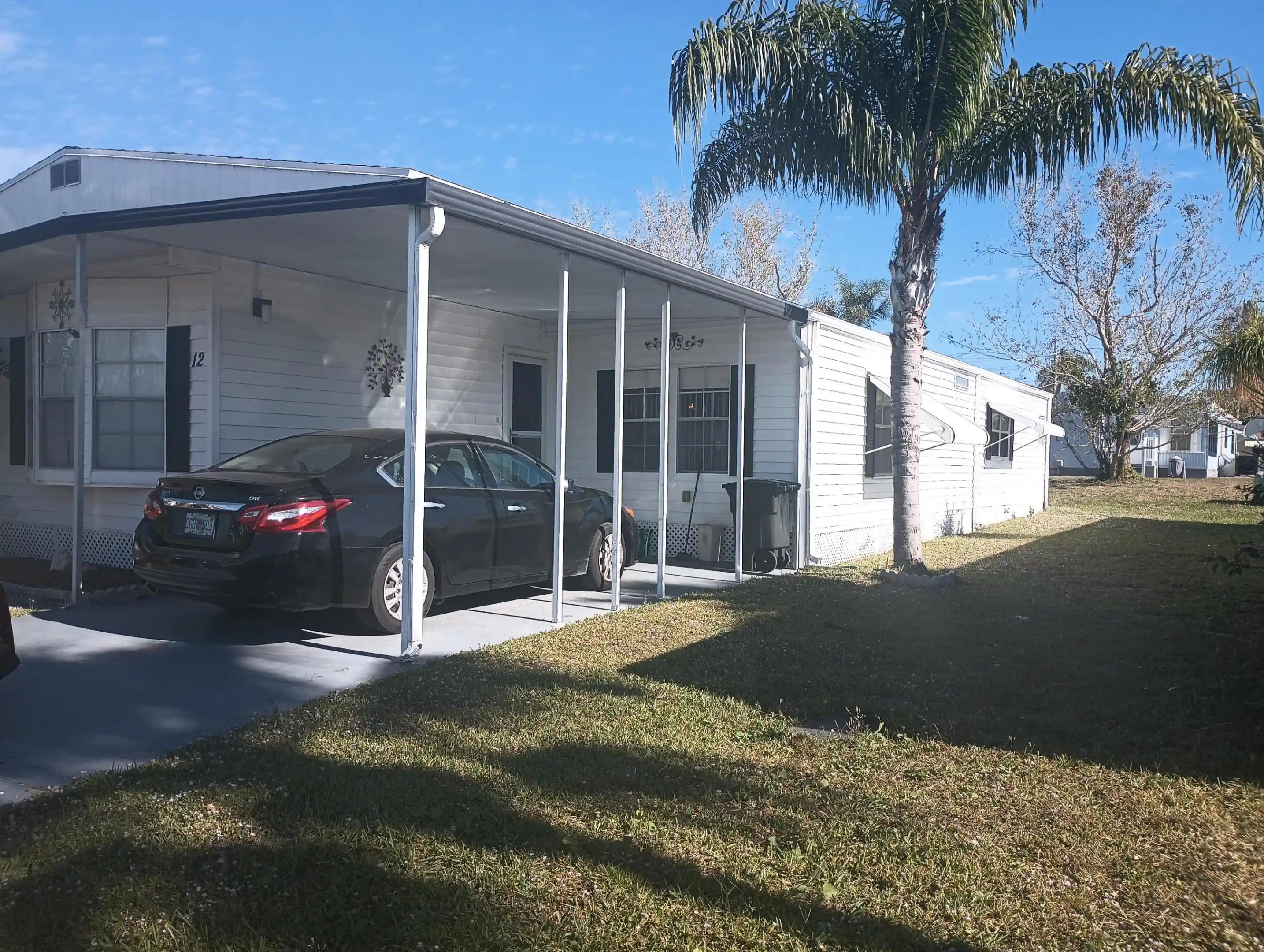 Photo 1 of Manufactured home for sale at 12 Universidad Ln, Port Saint Lucie, FL 34952 | MLS# B26083856 | Listing updated on 2026-10-28