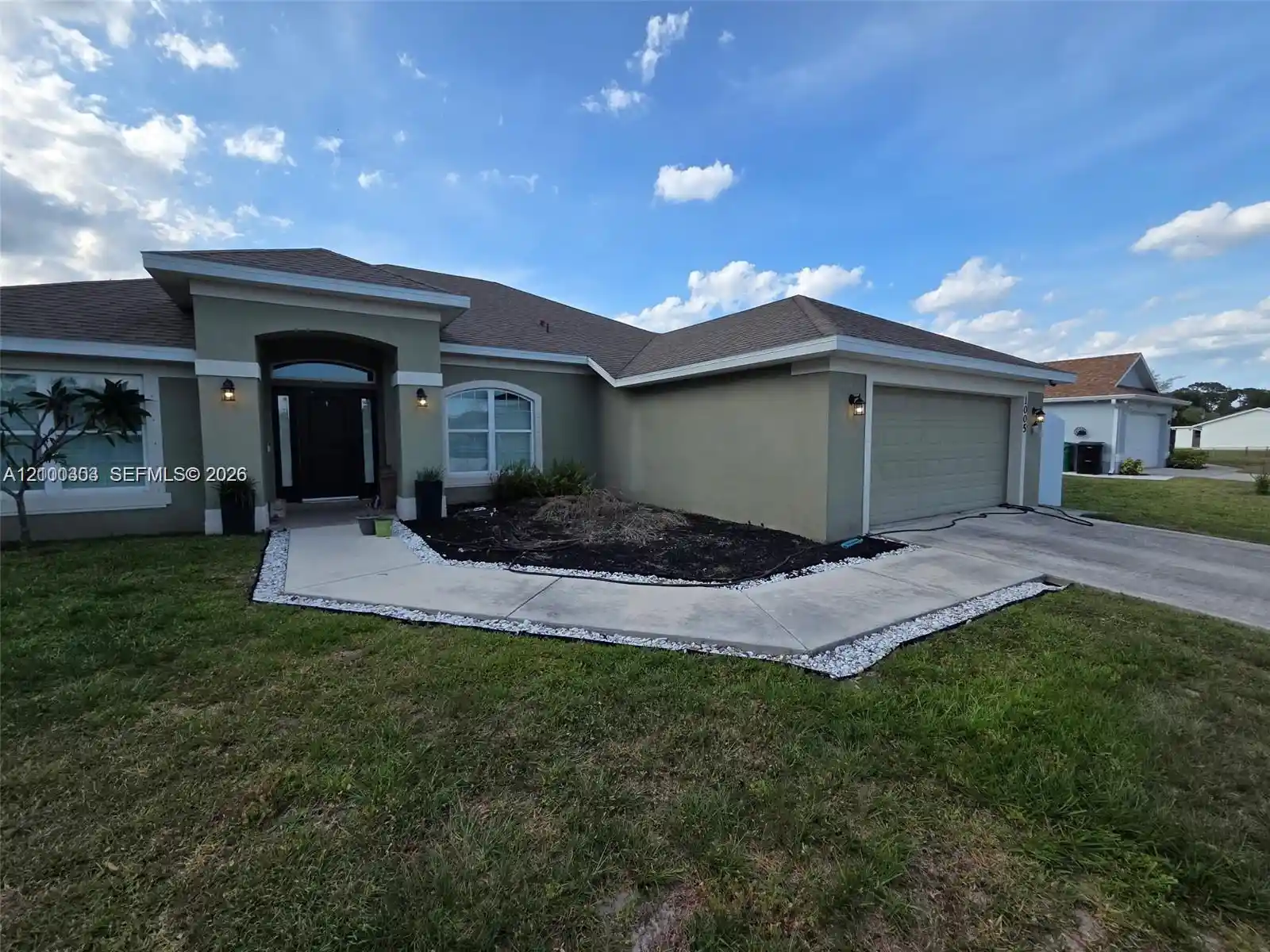 Photo 1 of Single family home for sale at 1005 Sw Bay State Rd, Port Saint Lucie, FL 34953 | MLS# A12100303 | Listing updated on 2026-10-31