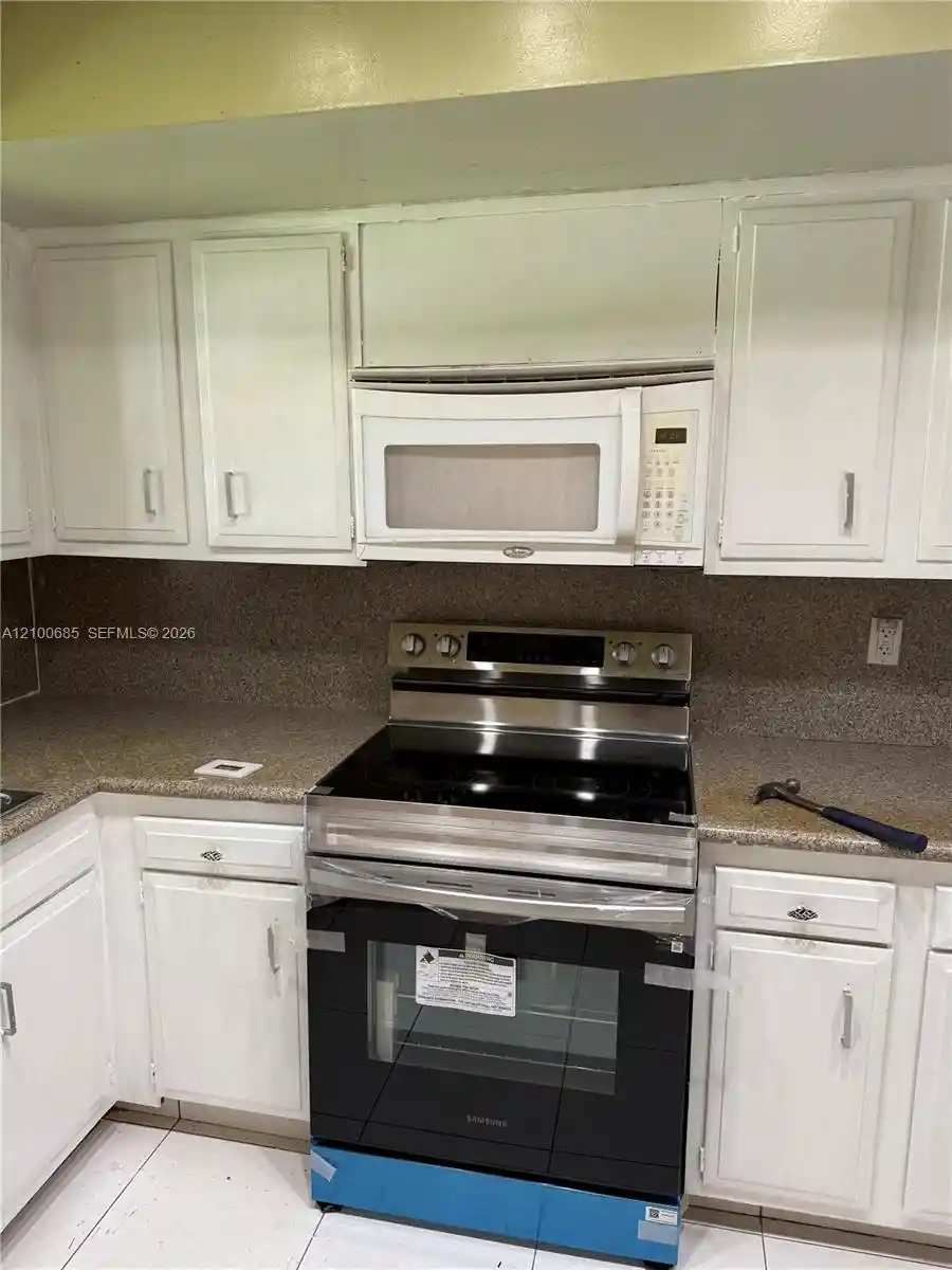 Photo 1 of Condo for sale at 1420 Sw 28th Avenue #6, Boynton Beach, FL 33426 | MLS# A12100685 | Listing updated on 2026-10-19