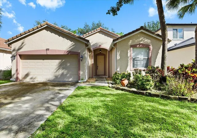 Photo 1 of Single family home for sale at 122 Seminole Lakes Dr, Royal Palm Beach, FL 33411 | MLS# B26084451 | Listing updated on 2026-10-05
