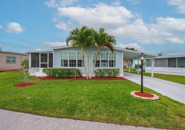 Photo 3 of Manufactured home for sale at 395 Ne Jade Cir, Jensen Beach, FL 34957 | MLS# B26084471 | Listing updated on 2026-10-05