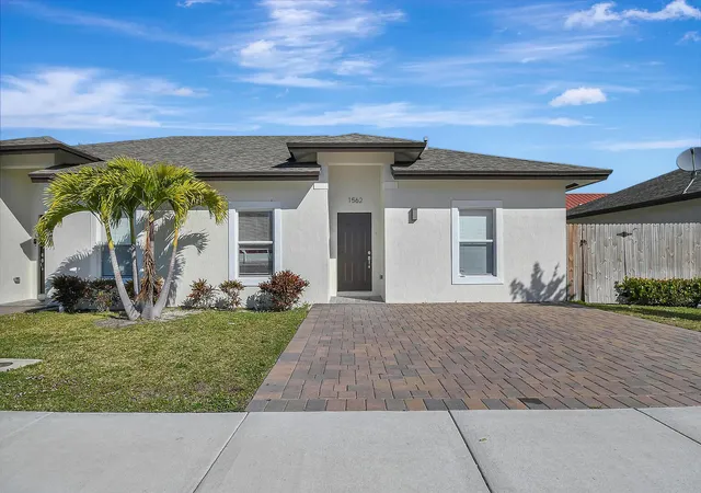 Photo 1 of Multi family home for sale at 1562 W 26th Court, Riviera Beach, FL 33404 | MLS# B26084928 | Listing updated on 2026-10-10