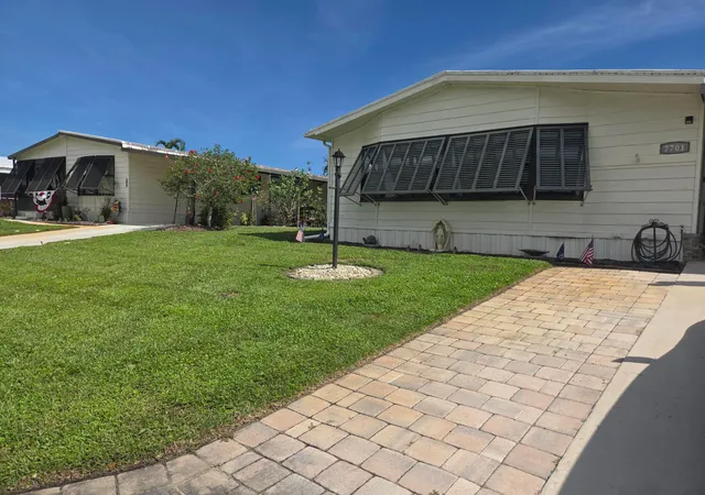 Photo 1 of Manufactured home for sale at 7701 Se Shenandoah Dr, Hobe Sound, FL 33455 | MLS# B26085202 | Listing updated on 2026-10-07
