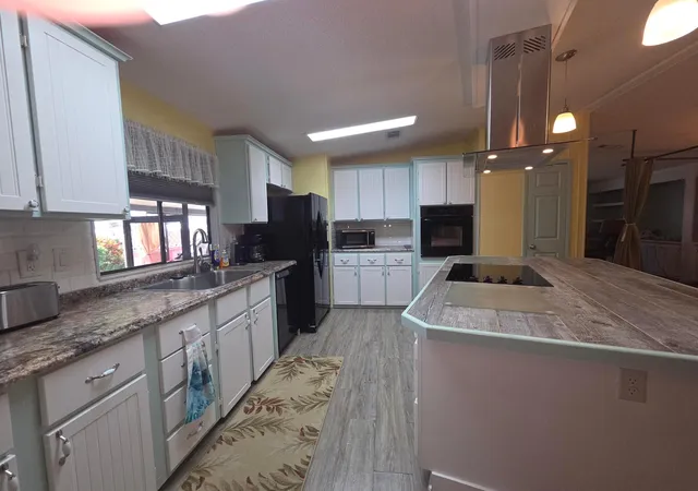 Photo 3 of Manufactured home for sale at 7701 SE Shenandoah Dr, Hobe Sound, FL 33455 | MLS# B26085202 | Listing updated on 2026-10-07