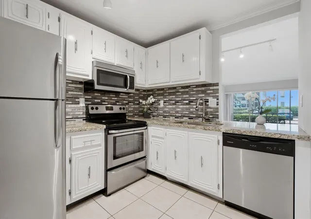 Photo 1 of Condo for sale at 485 N Pine Is Rd #A105, Plantation, FL 33324 | MLS# B26085604 | Listing updated on 2026-10-07