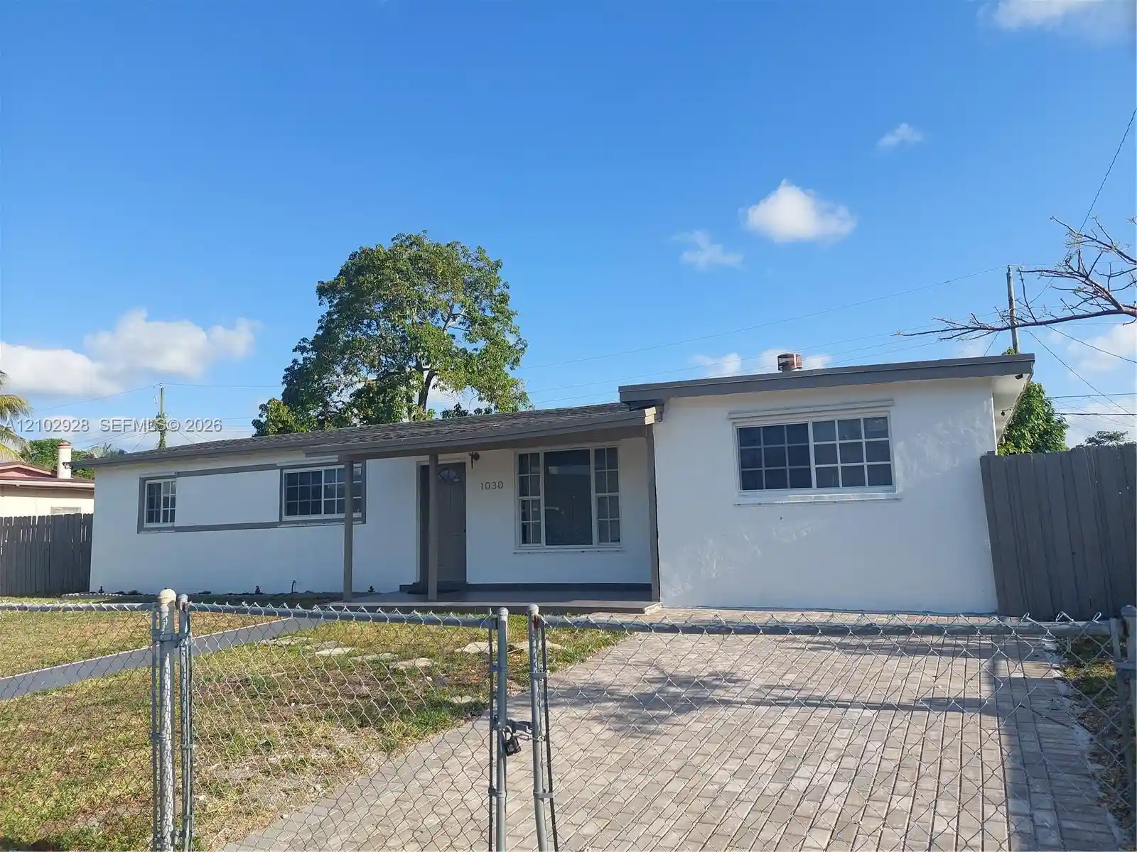 Single family home for sale at 1030 NE 214th Street, Miami, FL 33179 | MLS# A12102928