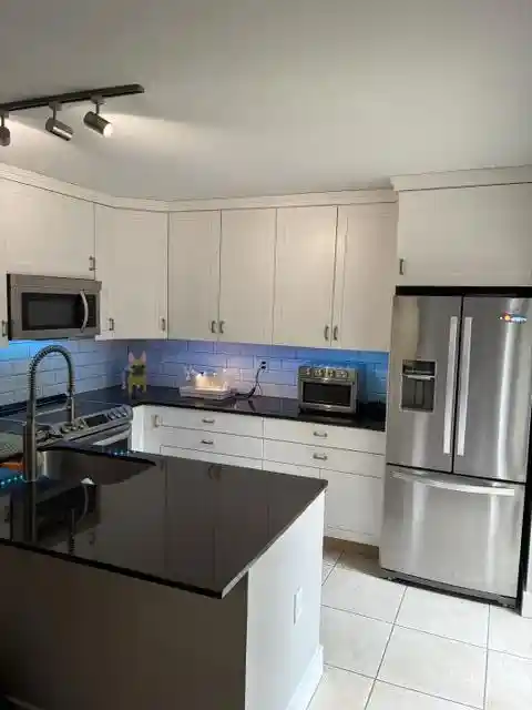Photo 1 of Townhouse for sale at 207 Live Oak Ln, Boynton Beach, FL 33436 | MLS# B26086627 | Listing updated on 2026-10-19