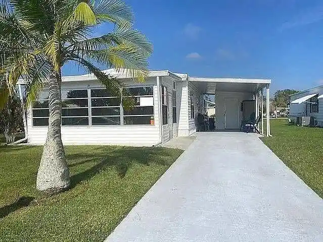 Photo 1 of Manufactured home for sale at 21 Flores Way, Port Saint Lucie, FL 34952 | MLS# B26088229 | Listing updated on 2026-10-18
