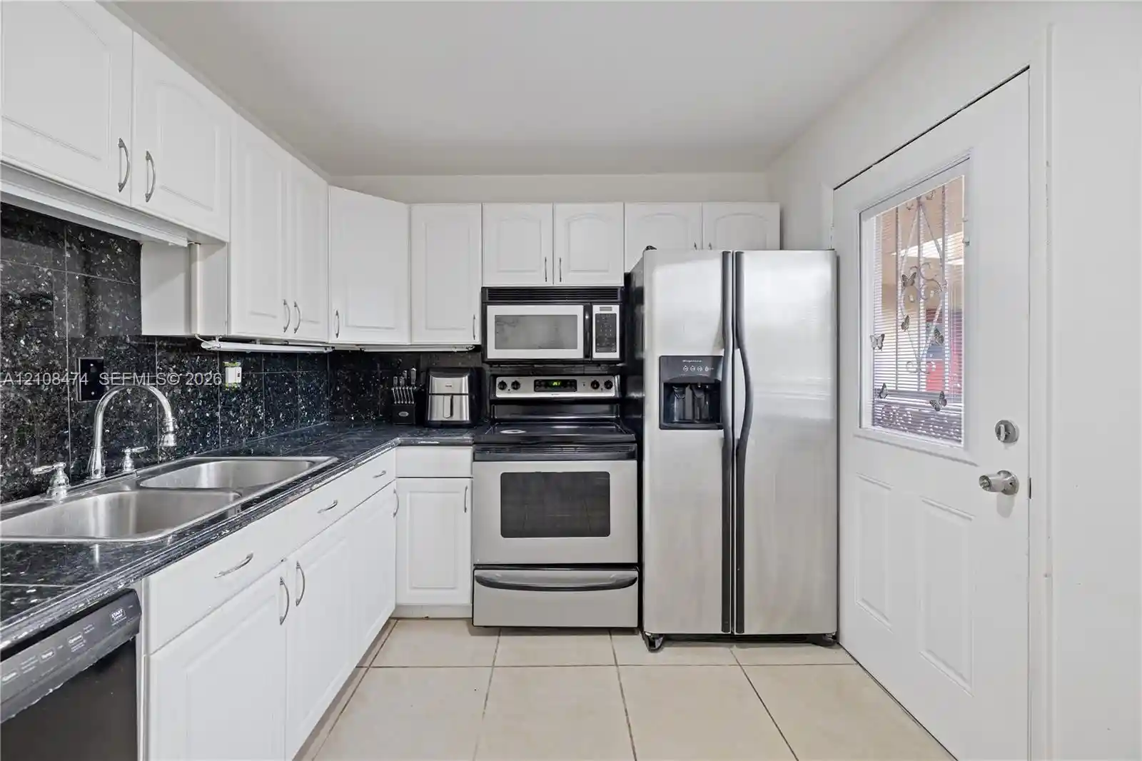 Listing Photo 1 - Condo for sale in 1501 NE 191st St located at 1501 NE 191st St, North Miami Beach, FL 33179 - Unit #C216