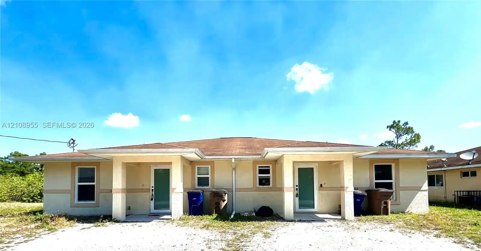 Multi family home for sale at 1412-1414 W 12th Street, Lehigh Acres, FL 33972 | MLS# A12108955