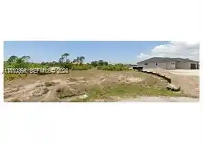 Photo 1 of Land for sale at 32 Leeward Ln, Port Charlotte, FL 33946 | MLS# A12110398 | Listing updated on 2026-10-21