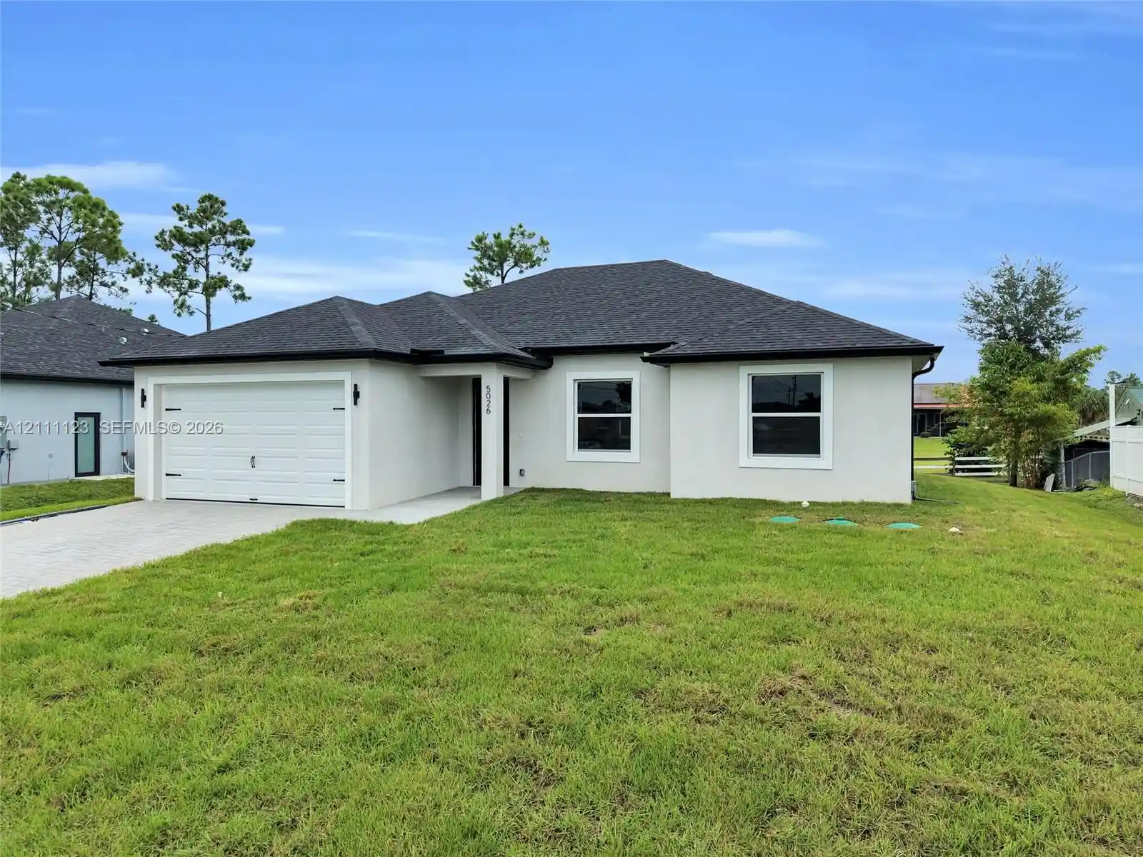 Photo 1 of Single family home for sale at 5026 Billings St, Lehigh Acres, FL 33971 | MLS# A12111123 | Listing updated on 2026-10-22