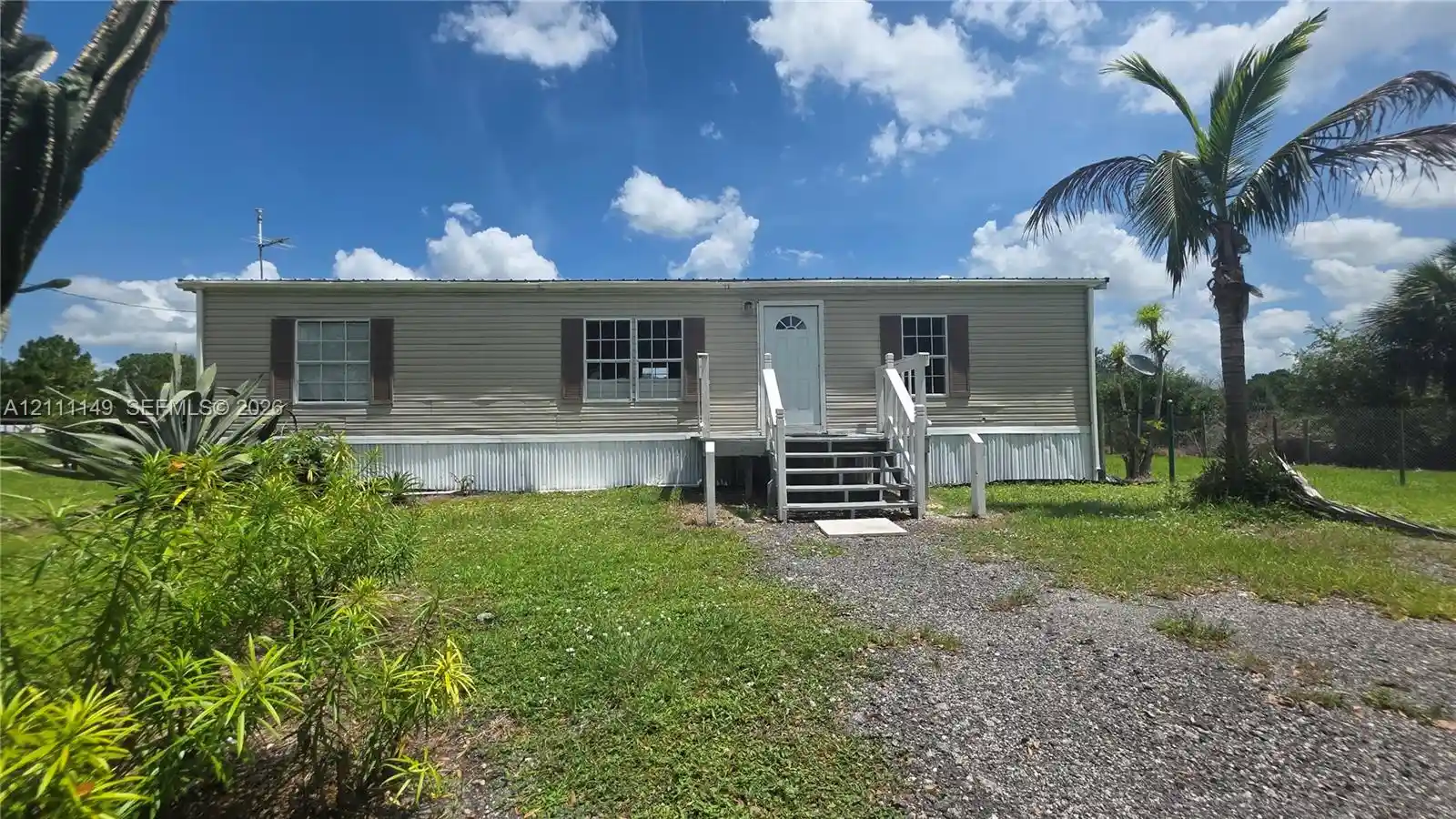 Photo 1 of Manufactured home for sale at 451 Bald Cypress Ave, Clewiston, FL 33440 | MLS# A12111149 | Listing updated on 2026-10-23
