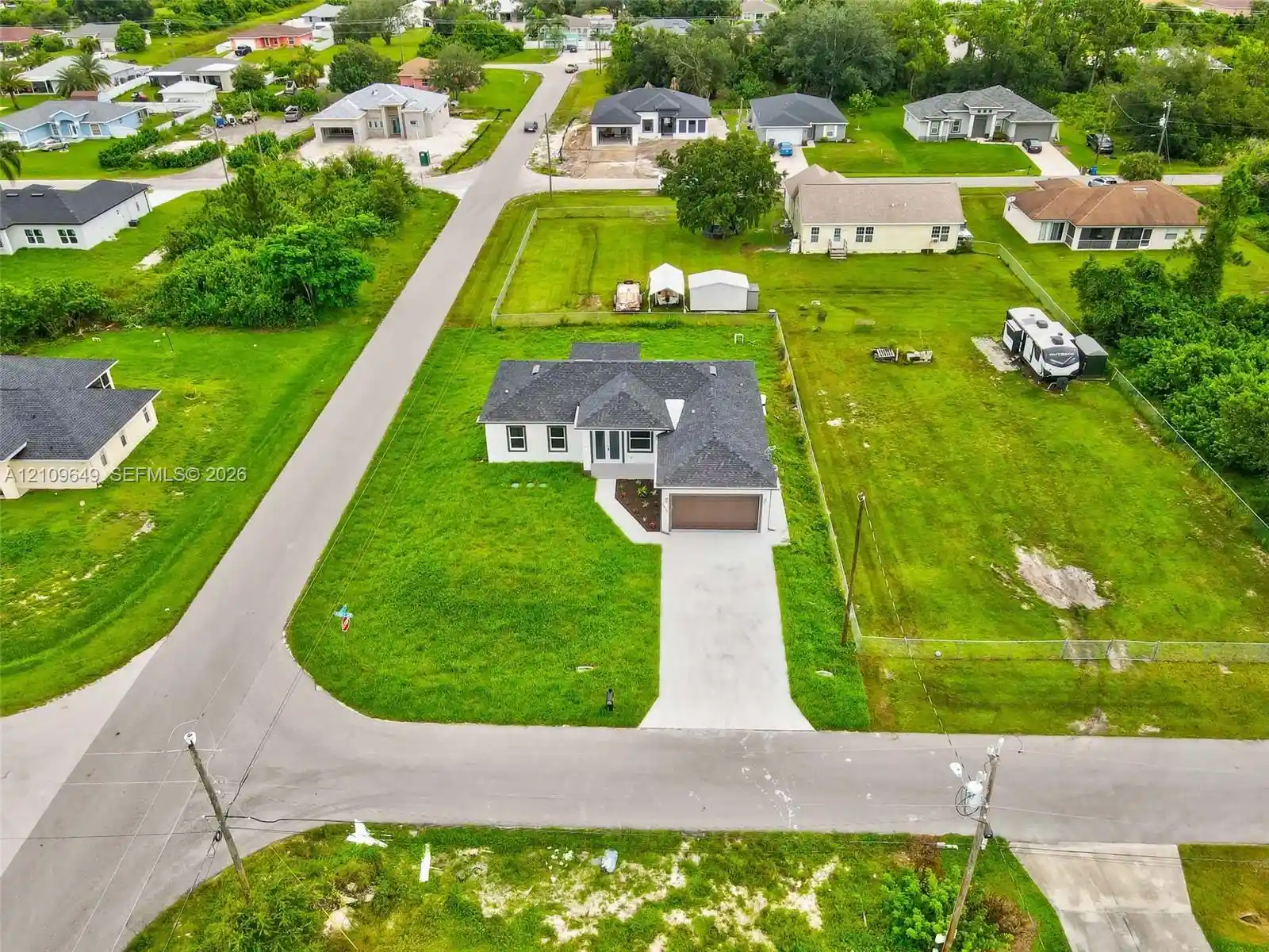 Photo 1 of Single family home for sale at 2818 42nd St Sw Lehigh Acres, Lehigh Acres, FL 33976 | MLS# A12109649 | Listing updated on 2026-10-26